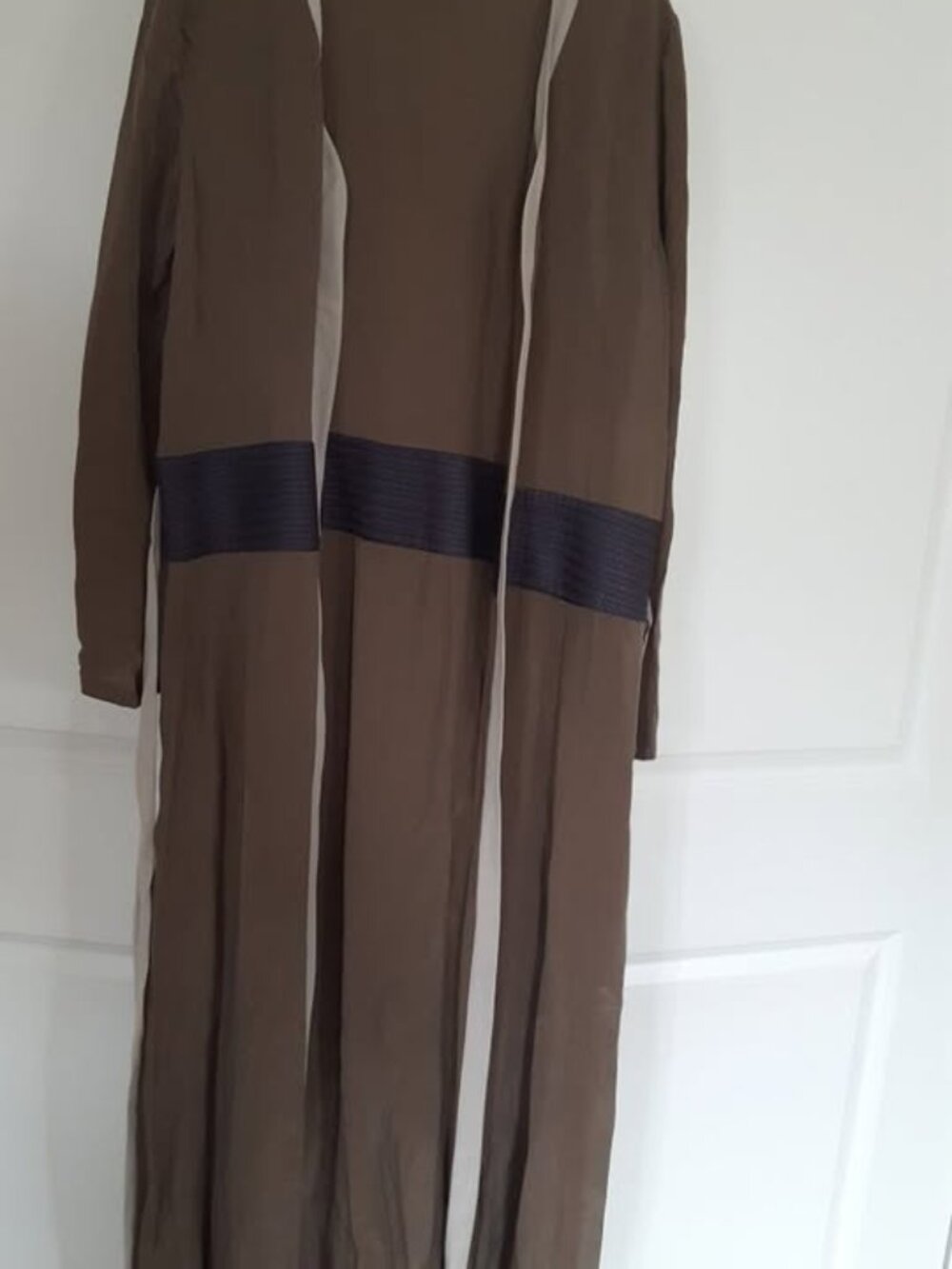 All Silk. beautiful summer jacket ,can be use as abbya too.